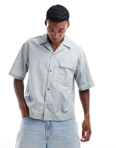 Chemise oversize coupe carrée en nylon avec manches courtes et col à revers - Asos Design - Modalova