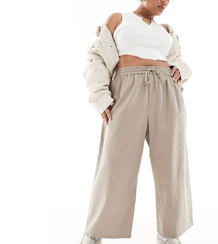 ASOS DESIGN Curve - Pantalon ample facile à enfiler en lin mélangé - Taupe - Asos Curve - Modalova