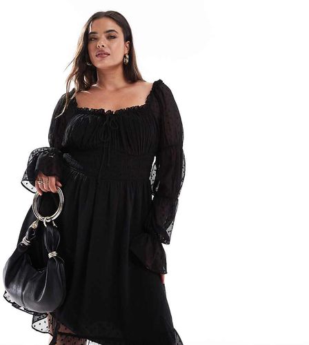 ASOS DESIGN Curve - Robe mi-longue à fleurs avec taille froncée et manches longues tendance folk - Asos Curve - Modalova