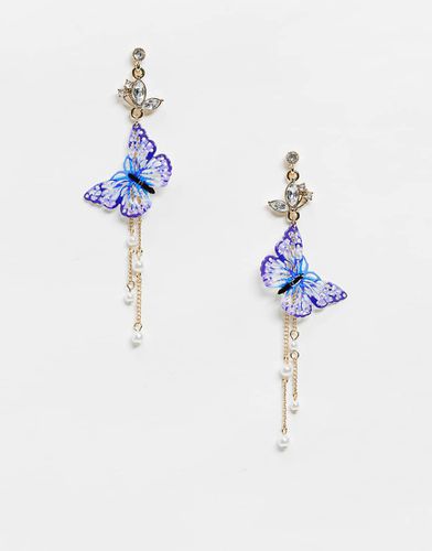 Boucles d'oreilles avec papillon bleu et perles - Asos Design - Modalova