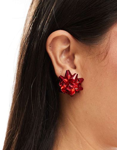 Boucles d'oreilles style naud de Noël - Asos Design - Modalova