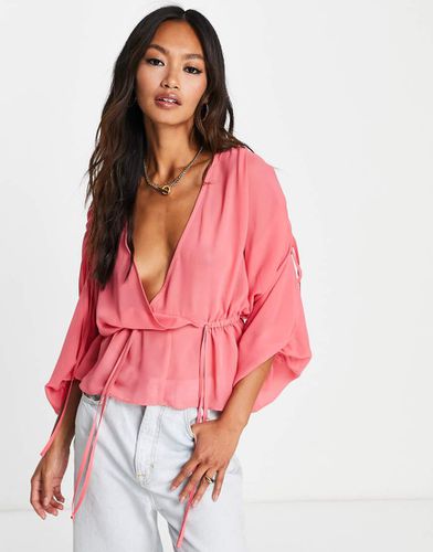 Blouse transparente à épaules froncées avec ourlet à volants - Asos Design - Modalova