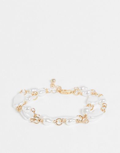Bracelet multi-rangs avec perles nacrées - Asos Design - Modalova