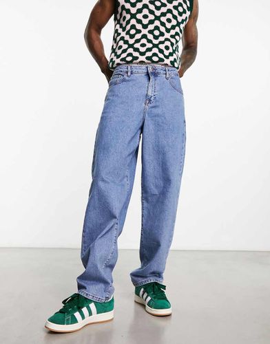 Jean baggy à taille basse - moyen délavé - Asos Design - Modalova