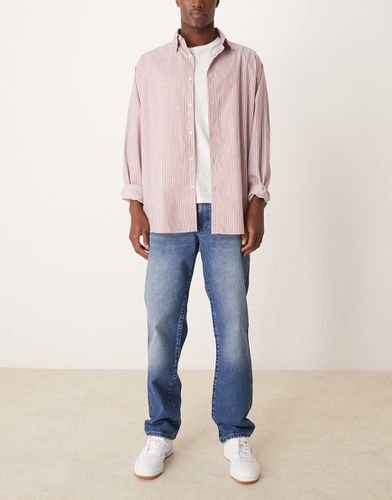 Jean droit à délavage grunge - Asos Design - Modalova