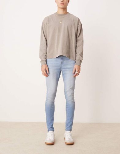 Jean en denim stretch résistant - Délavage clair - Asos Design - Modalova