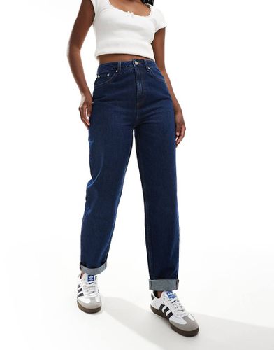 Jean mom décontracté à taille haute - Indigo délavé - Asos Design - Modalova