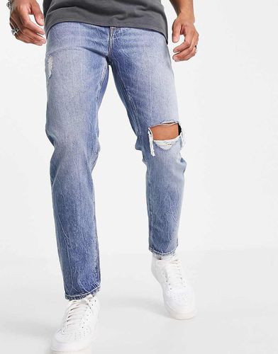 Jean rigide classique avec abrasions et déchirures aux genoux - Délavage clair - Asos Design - Modalova