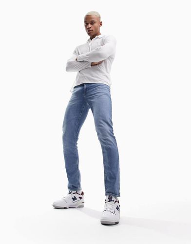 Jean slim stretch - délavé foncé - Asos Design - Modalova