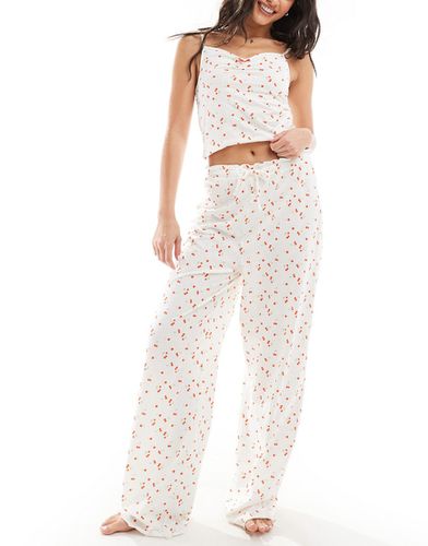 Mix & Match - Pantalon de pyjama à imprimé cerises et bords volantés - Asos Design - Modalova