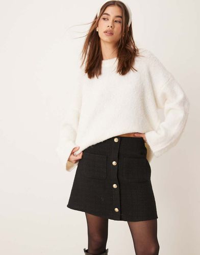 Mini-jupe boutonnée en bouclé - Asos Design - Modalova