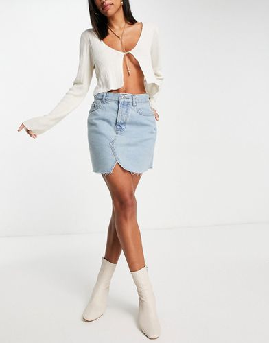 Mini-jupe en denim authentique à délavage moyen - Asos Design - Modalova