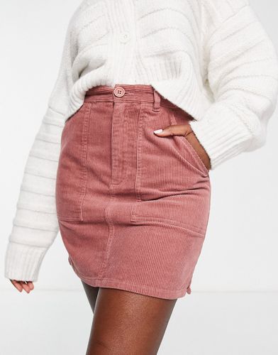Mini-jupe en velours côtelé à poches plaquées - Asos Design - Modalova
