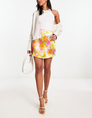 Mini-jupe satinée à ourlet arrondi et imprimé fleuri coloré - Asos Design - Modalova