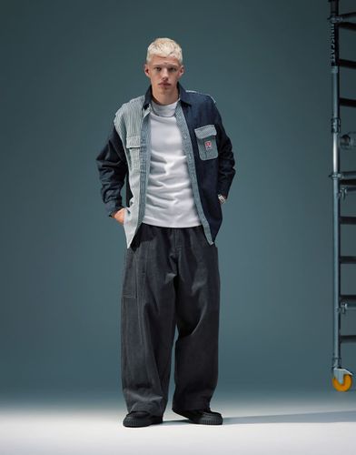 Pantalon coupe ballon oversize en velours côtelé avec poches latérales - Anthracite - Asos Design - Modalova