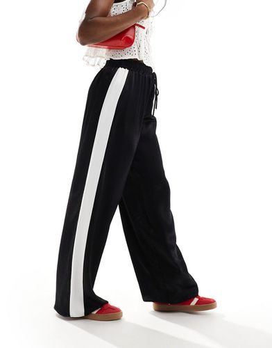 Pantalon contrastant en satin - Asos Design - Modalova
