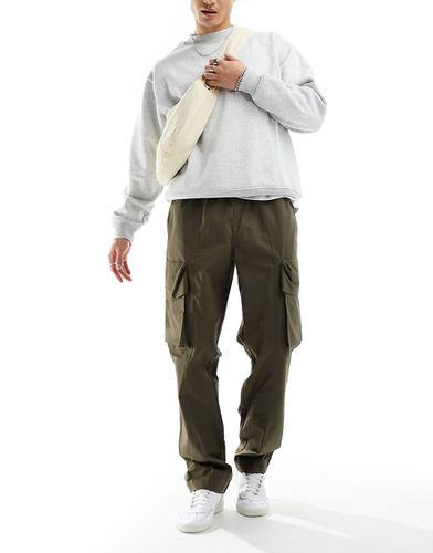 Pantalon cargo baggy en tissu ripstop avec taille élastique - Kaki - Asos Design - Modalova