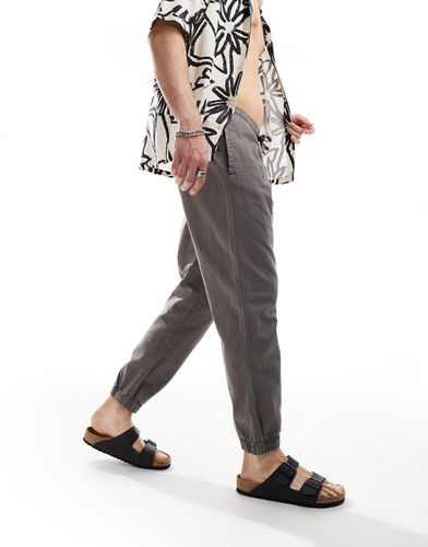 Pantalon cargo fuselé en lin à enfiler - délavé - Asos Design - Modalova