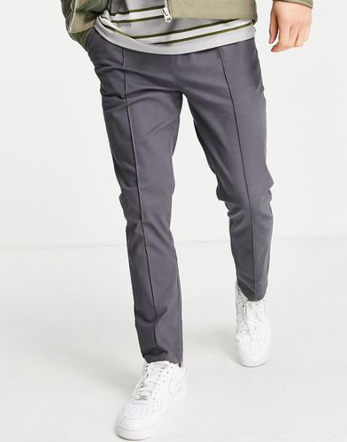 Pantalon chino ajusté avec taille élastique et nervures - Anthracite - Asos Design - Modalova