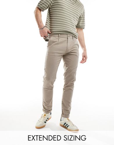 Pantalon chino ajusté - Beige délavé - Asos Design - Modalova