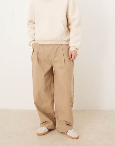 Pantalon chino baggy oversize  pinces - Beige - Asos Design - Modalova