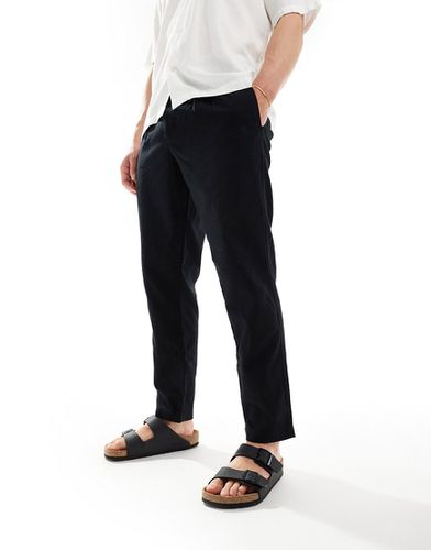 Pantalon chino large en lin avec pinces - Asos Design - Modalova