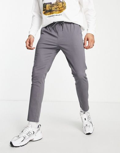 Pantalon chino skinny à taille élastique - Asos Design - Modalova