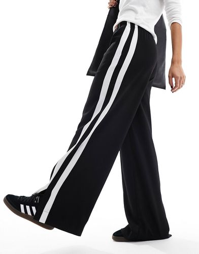 Pantalon à enfiler avec double empiècement contrastant - Asos Design - Modalova