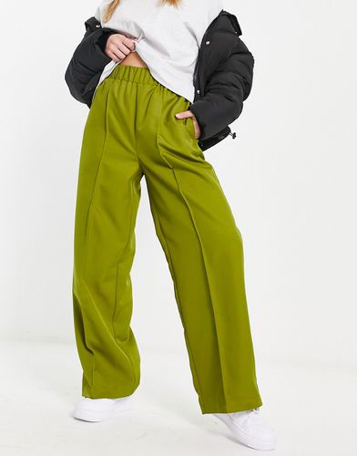 Pantalon ajusté à taille élastique - kaki - Asos Design - Modalova