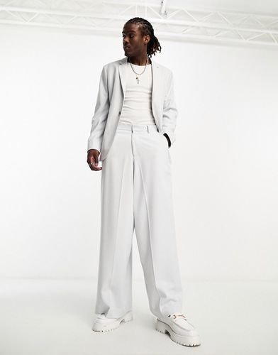 Pantalon de costume ultra ample en tissu micro-texturé - moyen - Asos Design - Modalova