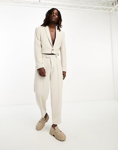 Pantalon de costume fuselé oversize en jersey texturé - Beige - Asos Design - Modalova