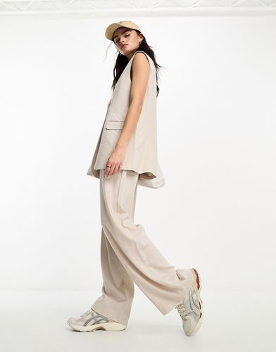 Pantalon de costume large à pinces en lin mélangé - Naturel - Asos Design - Modalova