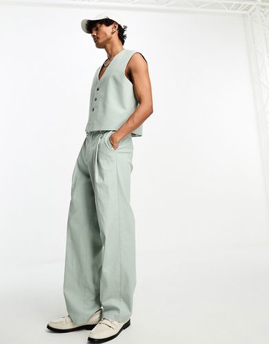 Pantalon de costume large et court en lin mélangé - Sauge - Asos Design - Modalova