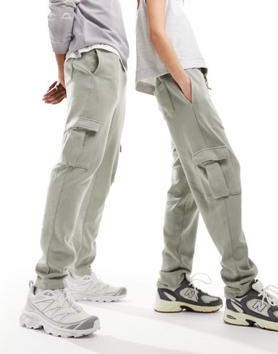 Pantalon de jogging unisexe fuselé avec poches cargo - délavé - Asos Design - Modalova