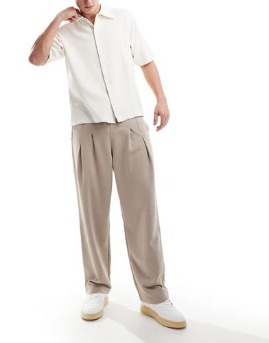 Pantalon de jogging ample plissé - Beige - Asos Design - Modalova