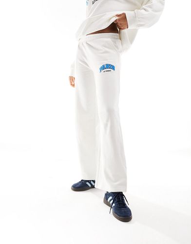 Pantalon de jogging d'ensemble oversize droit en molleton avec motif Paris - Crème - Asos Design - Modalova
