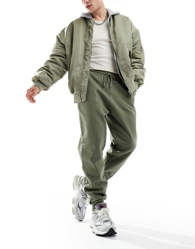 Pantalon de jogging fuselé épais - Kaki délavé - Asos Design - Modalova