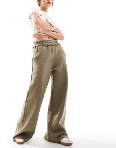 Pantalon de jogging large avec taille à bords décousus - Kaki - Asos Design - Modalova