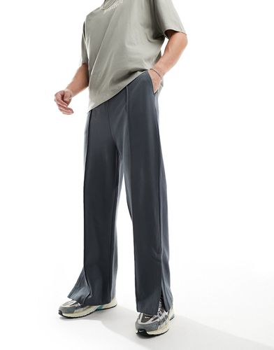 Pantalon de jogging oversize à fentes latérales - Noir délavé - Asos Design - Modalova
