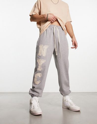 Pantalon de jogging oversize avec imprimé NYC - chiné - Asos Design - Modalova