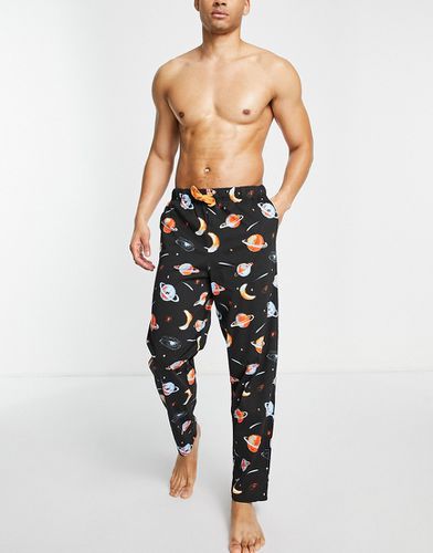 Pantalon de pyjama confort à imprimé spatial - Asos Design - Modalova