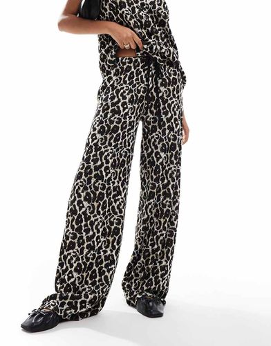 Pantalon d'ensemble ample à imprimé léopard - Asos Design - Modalova