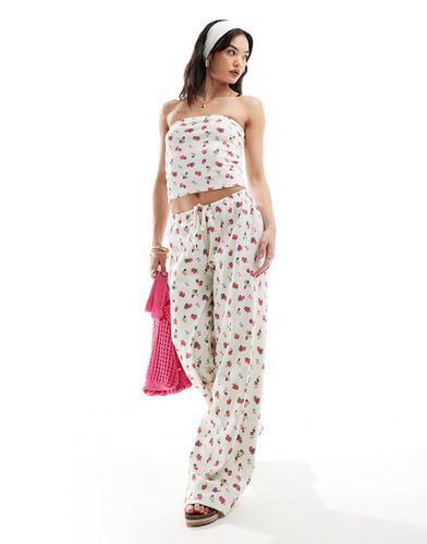 Pantalon d'ensemble gaufré coupe ample à imprimé fruits - Asos Design - Modalova