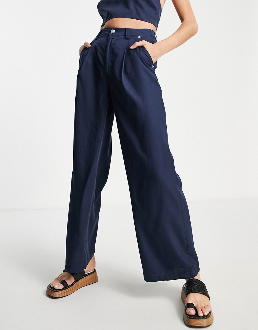 Pantalon d'ensemble large et fluide - marine - Asos Design - Modalova