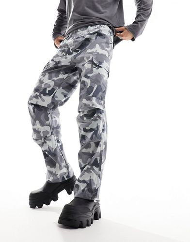 Pantalon large à imprimé camouflage - Asos Design - Modalova