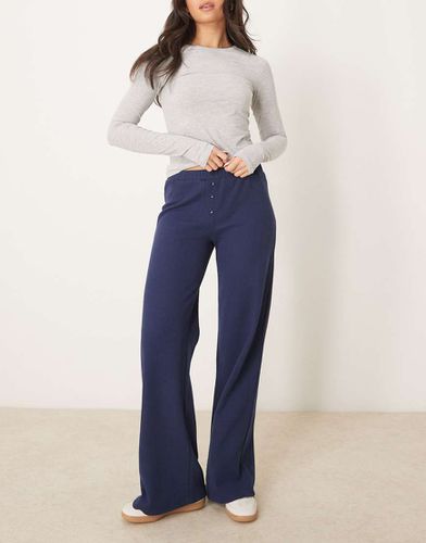 Pantalon large en tissu gaufré avec taille boxer - Asos Design - Modalova