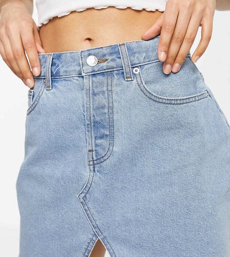 ASOS DESIGN Petite - Mini-jupe en jean authentique - Délavage moyen - Asos Petite - Modalova