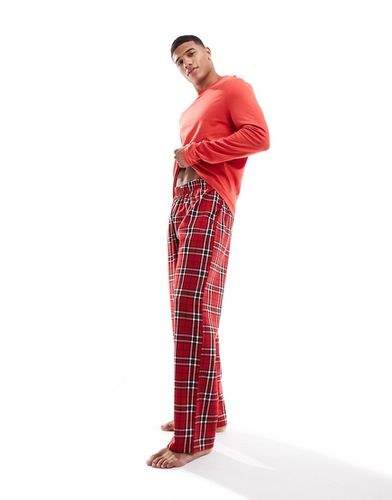 Pyjama avec t-shirt à manches longues et pantalon à carreaux - Asos Design - Modalova
