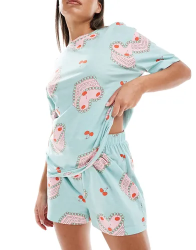 Pyjama avec t-shirt oversize et short à imprimé gâteaux - Asos Design - Modalova