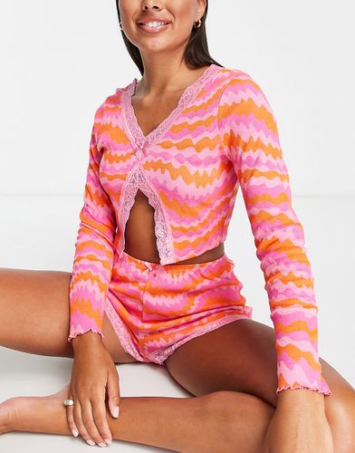 Pyjama avec top à manches longues et short à imprimé ondulé - et orange - Asos Design - Modalova